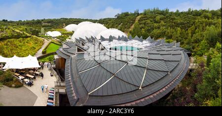 The Eden Project greenhouse biomes and the Core visitor centre a popular visitor attraction of botanical gardens housed in large domes