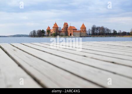 Trakai Island Castle in Lithuania with blurred boardwalk in foreground