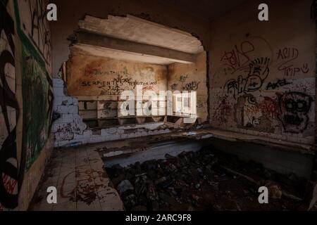 run down room inside abandoned building ruin Stock Photo