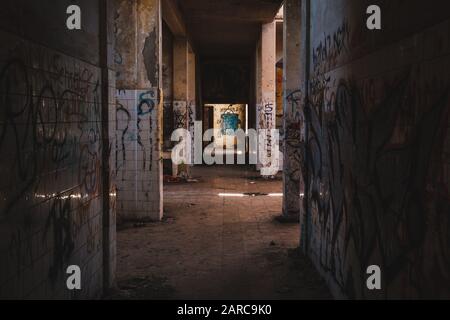 empty room inside abandoned building ruin - Stock Photo