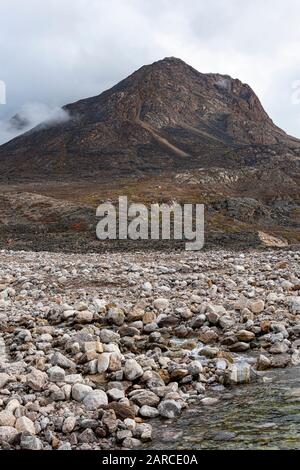 A remote mountain at the side od Rypefjord in east Greenland Stock Photo