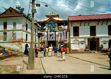 Kathmandu, Nepal - July 13, 2004: Unidentified people visit holy Lingam Temple in Pashupatinath Stock Photo