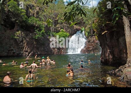 Adelaide River, NT, Australia - Unidentified people swimming in natural pool of Florence Falls in Litchfield national park Stock Photo