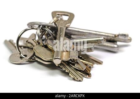 Bunch of keys isolated against white background Stock Photo