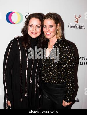 L-R) Kimberly Williams-Paisley and sister Ashley Williams attend