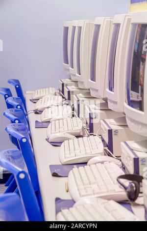 Retro style PC computers in classroom Stock Photo