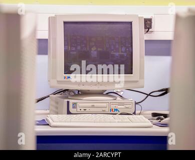 Retro style PC computers in classroom Stock Photo
