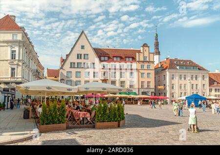 Locals and Tourists at the Raekoda Place in the Historical Old Town of Tallinn, Estonia Stock Photo