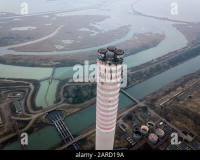 Abandoned coal power plant located in the delta of the river Po, Italy. Stock Photo