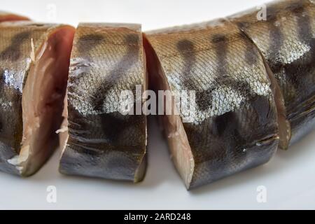 Sliced pieces of cold smoked mackerel, close-up Stock Photo