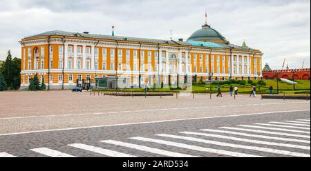 Ivanovskaya Square with the Kremlin Senate building in neoclassical architectural style on a cloudy day. Moscow, Russia. Stock Photo