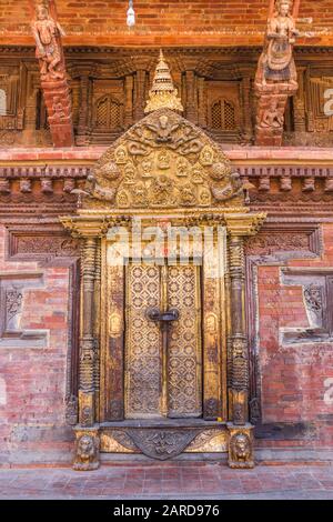 Golden door of the Sundari Chowk temple in Patan, Nepal Stock Photo