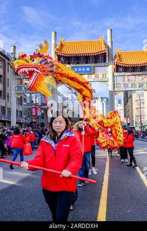 VanCity, Dragon dance team, Chinese Lunar New Year Parade, Chinatown, Vancouver, British Columbia, Canada Stock Photo