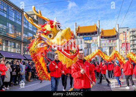 VanCity, Dragon dance team, Chinese Lunar New Year Parade, Chinatown, Vancouver, British Columbia, Canada Stock Photo