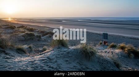 Dawn over the dunes at Camber Sands, Sussex, England. Stock Photo