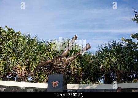 Ft. Pierce,FL/USA-1/27/20: The Navy SEAL Memorial statue of a frogman with the names of those SEALs that died in the line of duty. Stock Photo