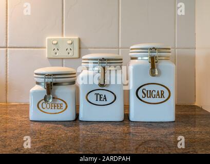 A set of coffee, tea and sugar porcelain jars Stock Photo
