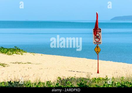 Warning sign for marine stingers on sandy beach at the Strand Townsville, North Queensland, Australia Stock Photo
