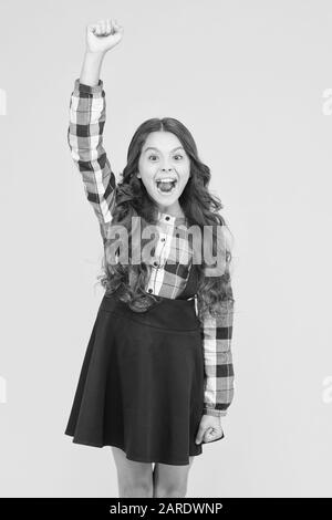 Curve soft curl tong. From tightly defined ringlets to loose beachy waves. Curly and happy. Small smiling child curly hairdo. Perfect curly hairstyle. Different shaped curling wands do to your hair. Stock Photo