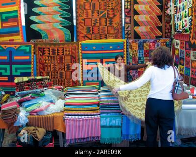 Rug seller Pisac, Peru Stock Photo