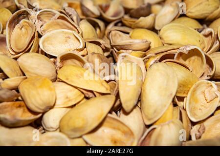 Pistachio shells. The background image of the surface texture close-up Stock Photo