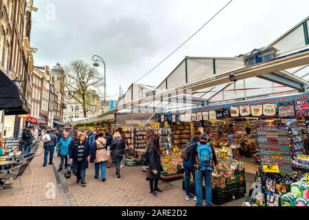 Amsterdam, Netherlands - April 13, 2018: Tourist at Bloemen Market (Bloemenmarkt) Amsterdam Netherlands Stock Photo