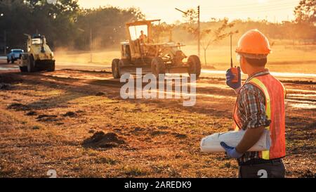 Engineers discussion with architects work planing in construction site Stock Photo