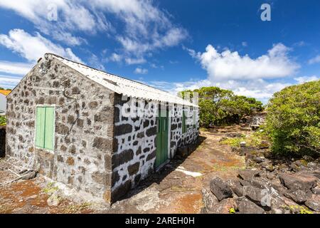An old building near vineyards on Pico island in the Azores, Portugal. Stock Photo