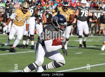 AFC running back Derrick Henry of the Tennessee Titans (22) and quarterback Lamar  Jackson of the Baltimore Ravens (8) during the Pro Bowl, Sunday, Jan. 26,  2020, at Camping World Stadium in