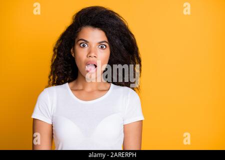 Photo of scared brown haired beautiful wife hold cheese grater bite lip  wear dotted apron purple bathrobe isolated on pink color background Stock  Photo - Alamy