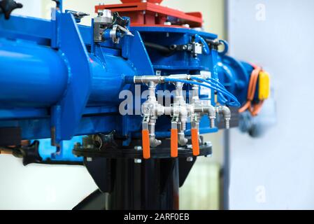 Ball valve on the water pipe. Gate valve. Control valve. Shutoff fittings. Regulation of water flow. Water supply. Stock Photo