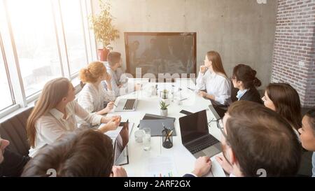 Business videoconference. Business team looking at screen Stock Photo