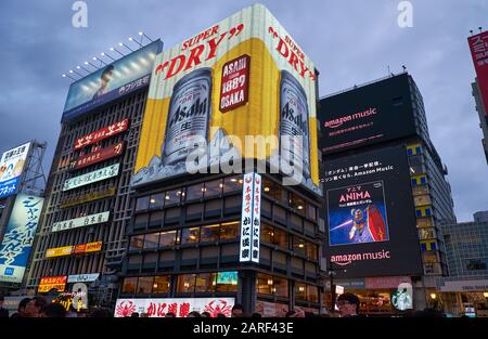 OSAKA, JAPAN - OCTOBER 14, 2019: The view of  gaudy neon lights and signage of night Dotonbori. Osaka. Japan Stock Photo