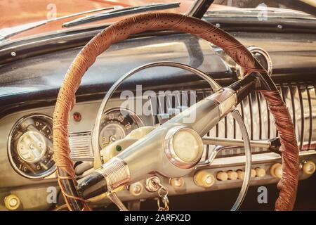 Retro styled image of the dashboard of a classic car Stock Photo