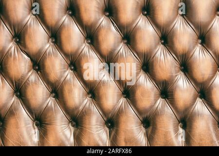 Background pattern of chesterfield buttoned brown leather Stock Photo