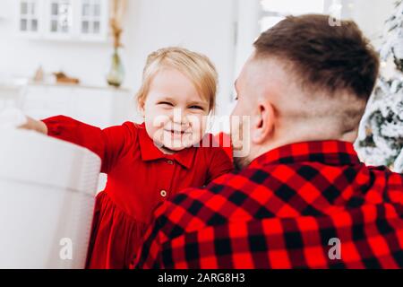 Father and daughter. The best father. Dad gives his daughter a present. Stock Photo