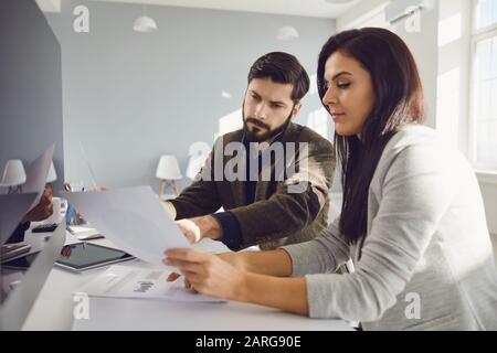 Discussion meeting business people in a white office. Stock Photo
