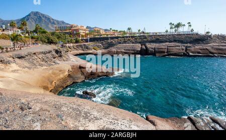 Rocks along the coast between Playa el Duque and Playa de Fanabe on Tenerife. Stock Photo