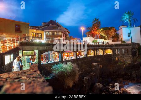 CANARY ISLAND TENERIFE, SPAIN - 25 DEC, 2019: Restaurant built in rocks in the city of Puerto de la Cruz on Canary island Tenerife. Stock Photo