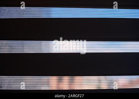 Office blinds. Modern fabric blinds. Office meeting room lighting range control. Stock Photo