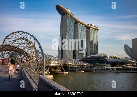 The Helix Bridge, Marina Bay Sands Hotel and part of Future World-ArtScience Museum in Marina Bay, Singapore, Southeast Asia, Asia Stock Photo