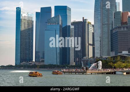 Tourist boats with the Merlion statue and Marina Bay skyline, Singapore, Southeast Asia, Asia Stock Photo
