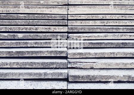 Front shot of old gray stone staircase for background Stock Photo