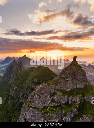 Dramatic sky at sunset over Pieter Both and Le Pouce mountain, aerial view, Moka Range, Port Louis, Mauritius, Africa Stock Photo