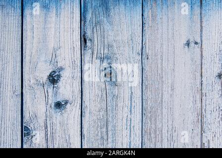 Weathered wooden wall covered with pale blue paint Stock Photo