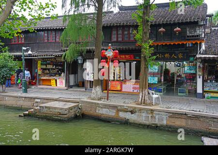 ZHUJIAJIAO, CHINA –27 OCT 2019- View of a water canal in Zhujiajiao (Pearl Stream), an ancient water town in the Qingpu District of Shanghai, China. Stock Photo