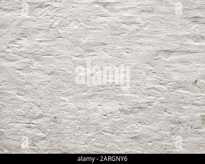 old wall with paint stains. background image in  grunge white concrete old texture wall Stock Photo