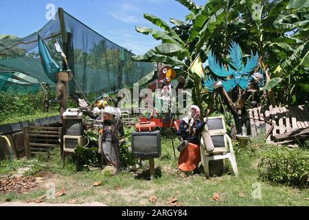 Artwork 'Internet Cafe' made of scrap equipment, La Digue, Seychelles. Stock Photo