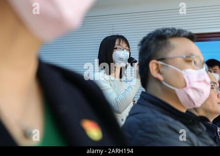 (200128) -- BEIJING, Jan. 28, 2020 (Xinhua) -- A journalist asks questions at a press conference held by the National Health Commission in Beijing, capital of China, Jan. 28, 2020. Wuhan, at the center of a viral pneumonia outbreak, will soon have 10,000 hospital beds reserved for infected patients as Chinese authorities take all means necessary to boost the city's overwhelmed health system. Jiao Yahui, an official with the National Health Commission, told a press conference held in Beijing on Tuesday that authorities have been designating over 5,300 beds in various hospitals in Wuhan to be Stock Photo