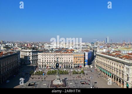 Piazza del Duomo and King Victor Emmanuel II statue seen from the roof of Duomo, Milan, Lombardy province, Italy, Europe Stock Photo